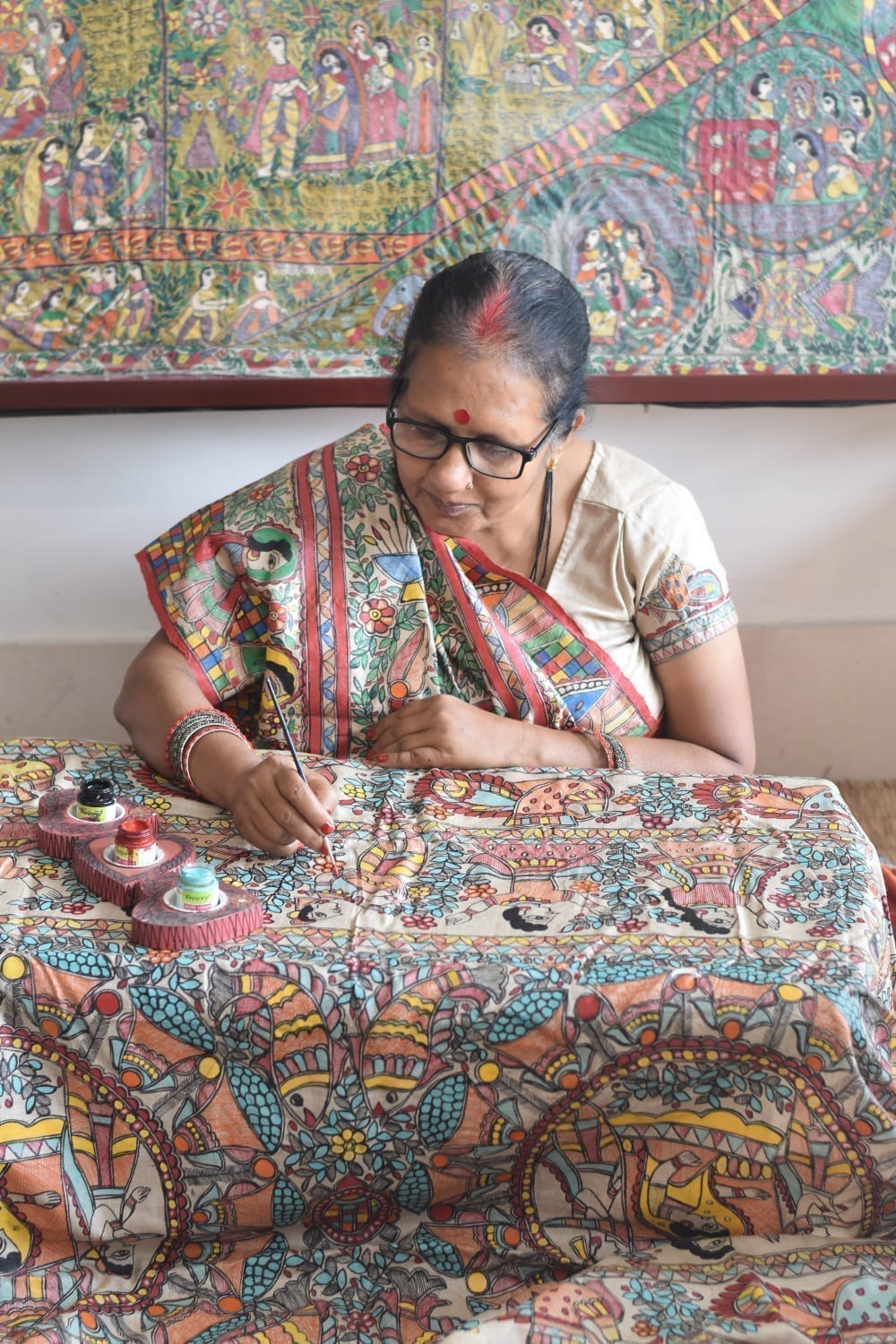 Madhubani artist Asha Jha of Bihar at work