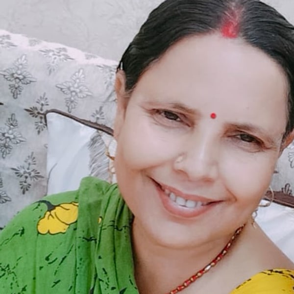 Ranju Jha, smiling