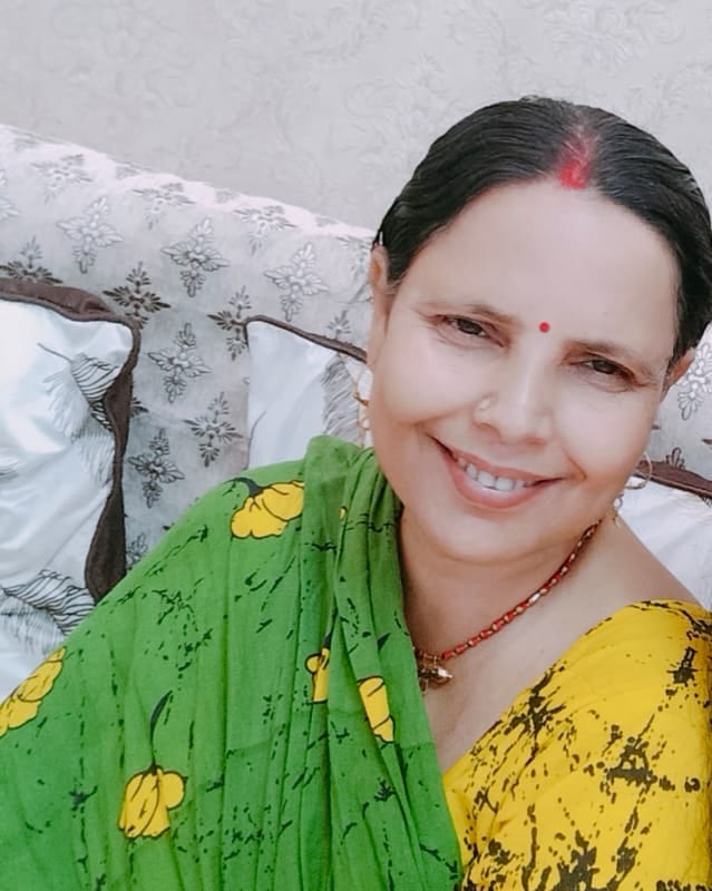 Ranju Jha smiling at home